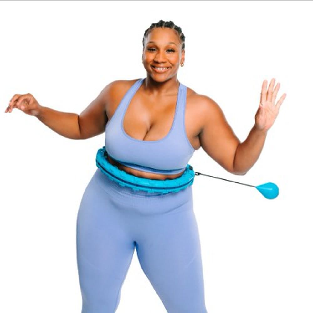 Woman working out with an Infinity Hoop smart weighted fitness hoop - Advirals case study